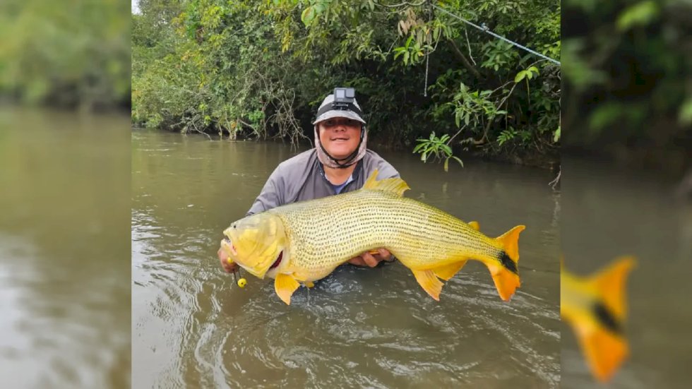 Guia fisga dourado de quase um metro e 14 quilos no Rio Vacaria